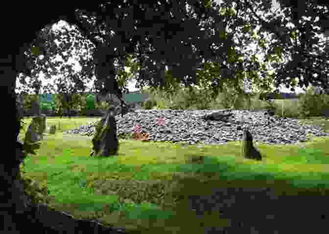 A Panoramic View Of The Clava Cairns, Showcasing The Multiple Burial Mounds And Standing Stones Against A Backdrop Of Rolling Hills. A Visitors Guide To Clava Cairns