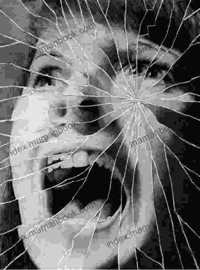 A Shattered Mirror Reflecting A Distorted Image Of A Person's Face Shattered Reflections Aaron B Daniels
