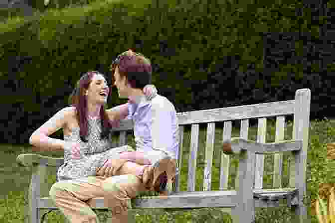 A Young Couple Sitting On A Bench In A Park, Laughing And Holding Hands. His Sunshine Girl ( Sreepuram 3): Friends To Lovers Romance