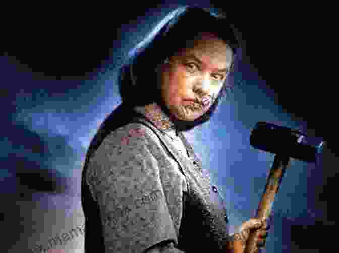 Annie Wilkes, The Psychopathic Nurse From Stephen King's 'Misery,' Holds A Sledgehammer Threateningly Misery: A Novel Stephen King