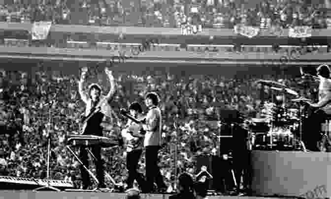 Image Of The Beatles Performing In A Stadium The Pop Music Quiz